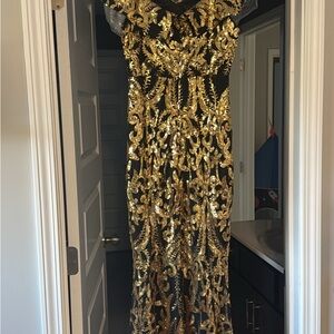 Glamorous Black and Gold Sequin Gown